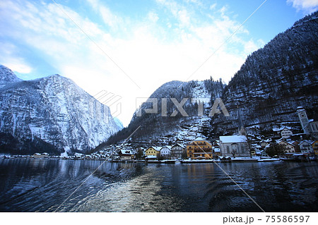 the reflection on the lake in hallstatt, austria the reflection on the lake in hallstatt, austria 75586597