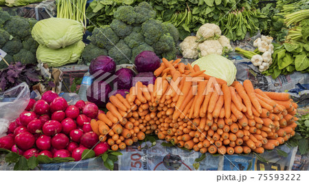 Istanbul, Turkey May 31, 2016 - Carrots, radishes, onions and other vegetables are on display 75593222