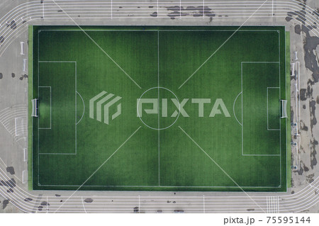 Large green football field at stadium closeup 75595144