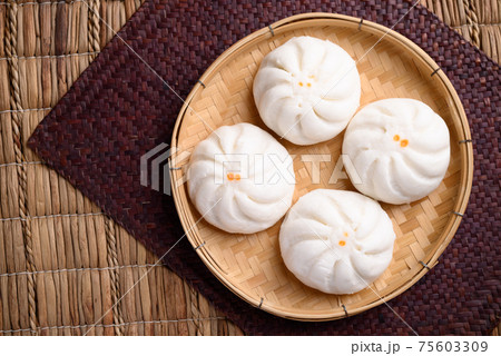 Steamed buns stuffed with minced pork, Asian food Steamed buns stuffed with minced pork, Asian food 75603309