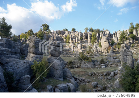 Beautiful rock formations under blue sky. Beautiful rock formations under blue sky. 75604998