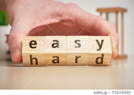 The concept of changing the degree of difficulty is easy and hard on wooden cubes 75614880