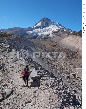Woman on the Timberline Trail on Mount Hood, Oregon. Woman on the Timberline Trail on Mount Hood, Oregon. 75615224