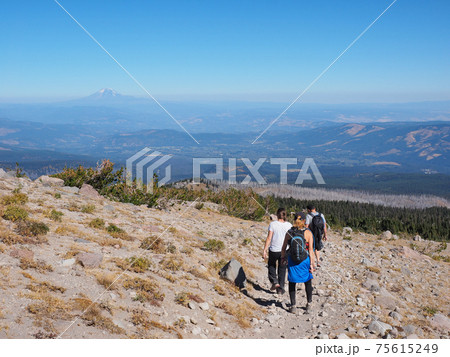 Hikers on the Timberline Trail on Mount Hood, Oregon. 75615249