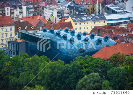 Kunsthaus Graz, the ultra-modern Graz Art Museum for contemporary art, looking a little like some alien life form plunked in the middle of Graz's old architecture. 75615340