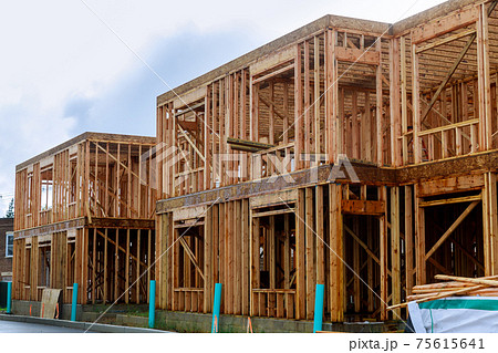 Wood building frame structure on a new development 75615641