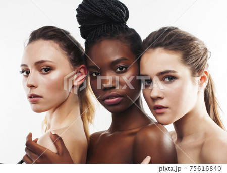 three different nation woman: african-american, caucasian together isolated on white background happy smiling, diverse type on skin, lifestyle real people concept 75616840
