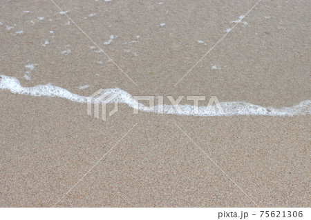 Coastline, wave on the beach sand. 75621306