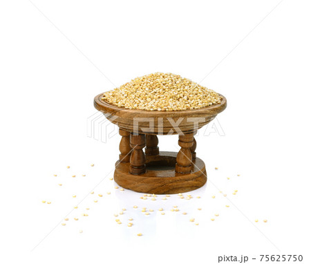 white quinoa seeds in wooden bowl isolated on white background with clipping path and full depth of field white quinoa seeds in wooden bowl isolated on white background with clipping path and full depth of field 75625750