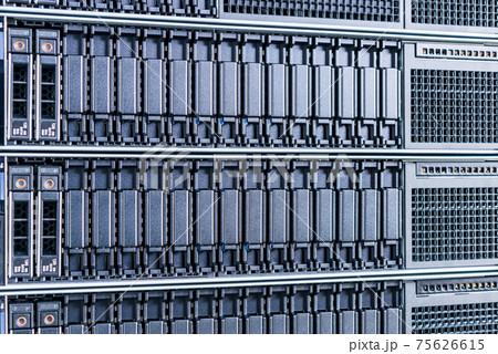 cluster of data storage SSD hard drives inside server rack 75626615