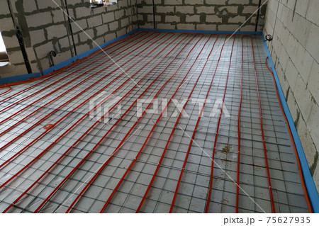 Installation of a heat-insulated floor, installation of water pipes, modern technology of heating of the house. 75627935