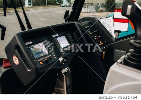 Crane control panel in the driver's cab of a car crane Crane control panel in the driver's cab of a car crane 75631764