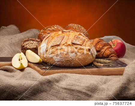 Different types of fresh bread 75637724