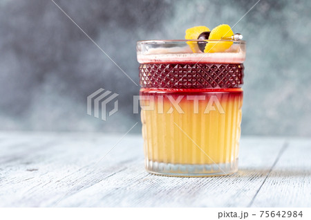 Glass of New York Sour cocktail 75642984