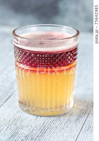 Glass of New York Sour cocktail 75642985
