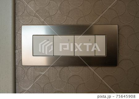 A block of four switches in a metal frame. Illumination on the switch keys. A block of four switches in a metal frame. Illumination on the switch keys. 75645908