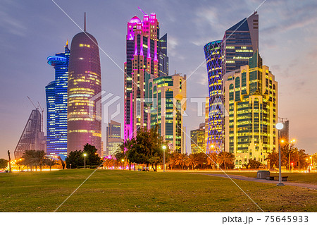 Doha skyline at dusk from Sheraton park  with clouds in the sky 75645933