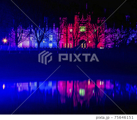 Illuminated water splash by night in  Torun, Poland 75646151