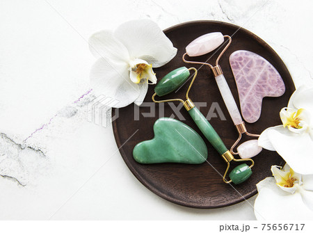 Jade face rollers for beauty facial massage therapy 75656717