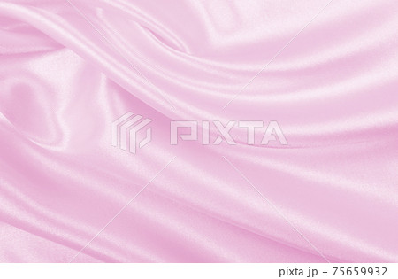 Smooth elegant pink silk or satin texture as wedding background. Luxurious background design 75659932