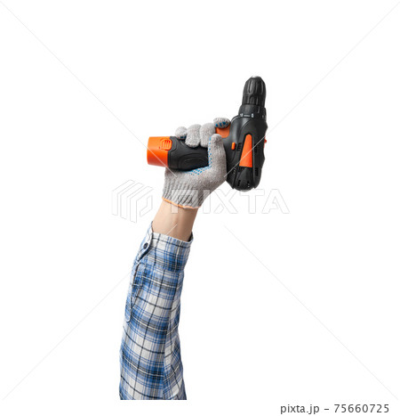 hand holds a construction tool accumulator drill - perforator 75660725