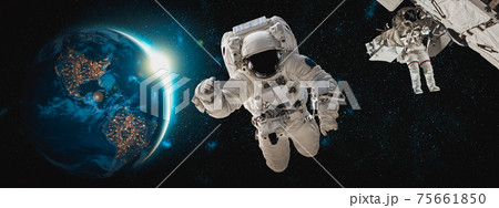 Astronaut spaceman do spacewalk while working for space station 75661850