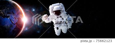 Astronaut spaceman do spacewalk while working for space station 75662123