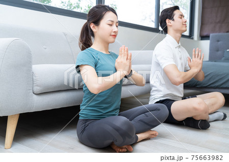 Couple exercise at home Couple exercise at home 75663982