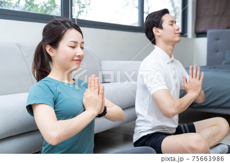 Couple exercise at home Couple exercise at home 75663986