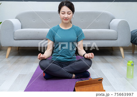 Woman exercise at home 75663997