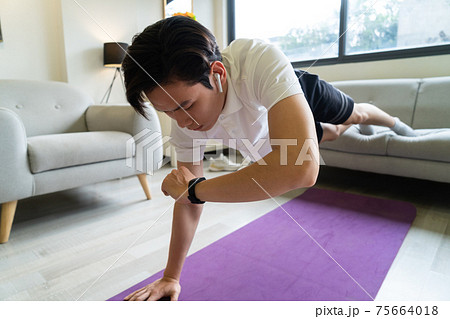 Man exercise at home Man exercise at home 75664018
