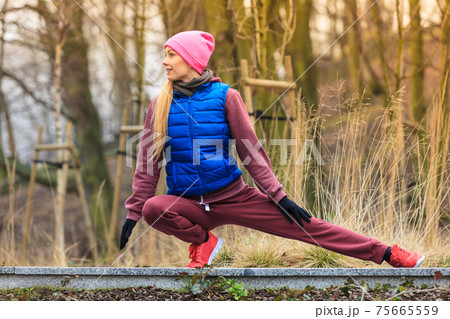 Outdoor Sport Exercises, Sporty Outfit Ideas. Woman Wearing Warm