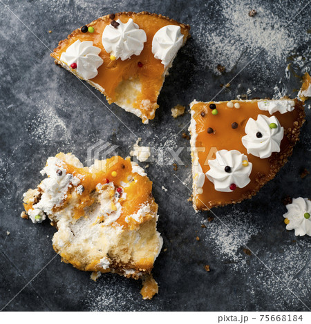 pieces of a cake on gray stone surface 75668184