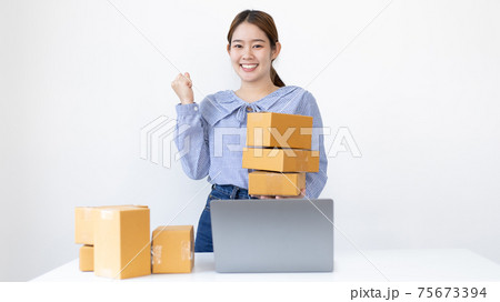 Young woman was happy after receiving an order from an internet customer, New business style for young people working at home and owning businesses, Sell online or Online sell concept. 75673394
