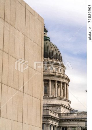The famous dome of the Utah State Capitol Building viewed behind a wall The famous dome of the Utah State Capitol Building viewed behind a wall 75686908