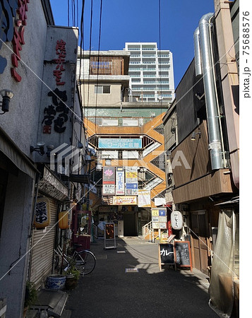 中野駅北口の路地風景とホテルワールド会館の建物の写真素材