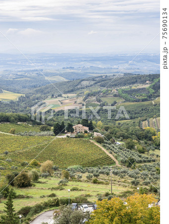 Top view of the Chianti valley in autumn from the town Castellina Di Chianti, Tuscany, Italy 75690134