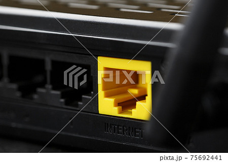Yellow Internet connector for connection to the network, Wi-Fi router for Internet access Yellow Internet connector for connection to the network, Wi-Fi router for Internet access 75692441