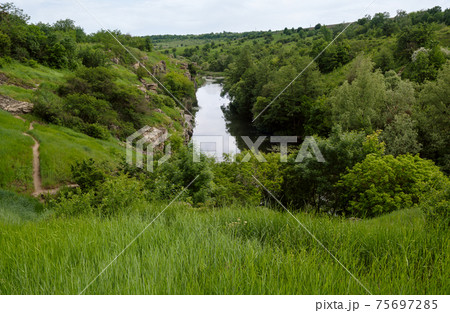 Buky Canyon summer landscape, Hirskyi Tikych river, Cherkasy Region, Ukraine. 75697285