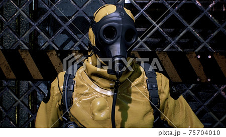 A nuclear physicist sits on a neon street and checks the surrounding radiation with a dosimeter. Post-apocalyptic world concept. 3D Rendering. A nuclear physicist sits on a neon street and checks the surrounding radiation with a dosimeter. Post-apocalyptic world concept. 3D Rendering. 75704010