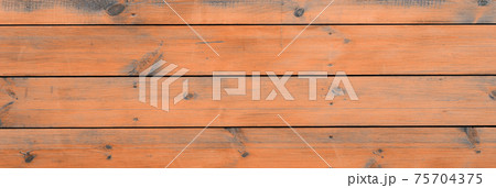Varnished wood background from cabin exterior. Brown wood barn plank Varnished wood background from cabin exterior. Brown wood barn plank 75704375