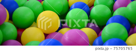 Swimming pool for fun and jumping in colored plastic balls Swimming pool for fun and jumping in colored plastic balls 75705765