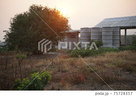 reinforced concrete rings use as water storage tank. collecting water for use in home 75728357