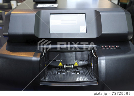 Cash receiver of the deposit machine set ready for work 75729393