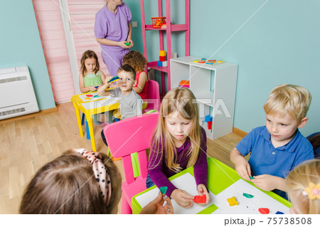 the happy children with tutors sculpt from plasticine 75738508