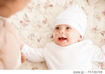 Happy loving family. Mother and her son child boy playing and hu 75738746