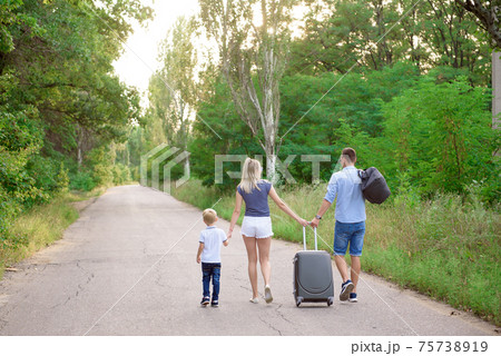 Family car trip. Summer holidays, vacation, travel, road trips and people concept. 75738919