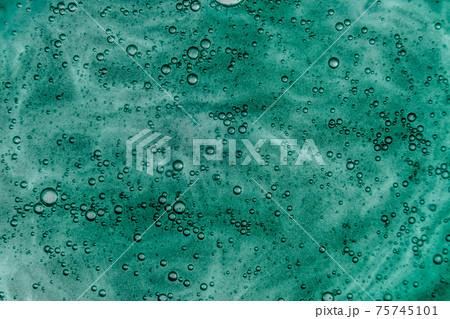 Liquid cream gel, green blue cosmetic texture with bubbles 75745101