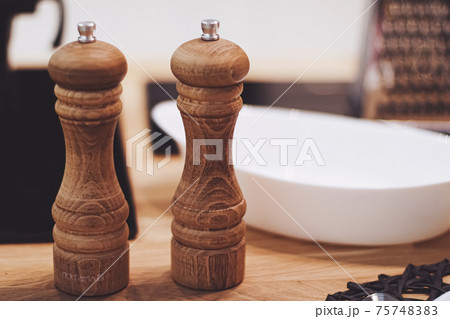 Wooden salt and pepper shaker set in the kitchen, eco-friendly product and home decor 75748383