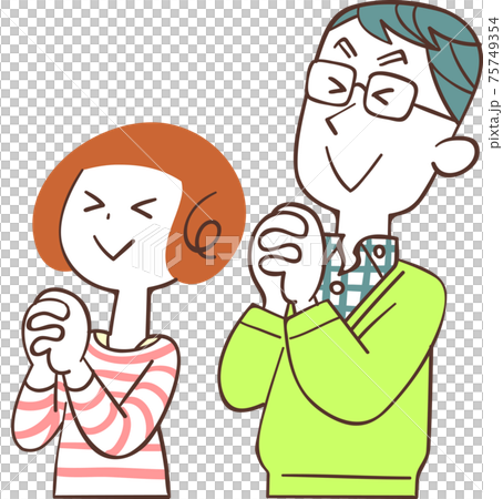 目を瞑って祈る夫婦 75749354